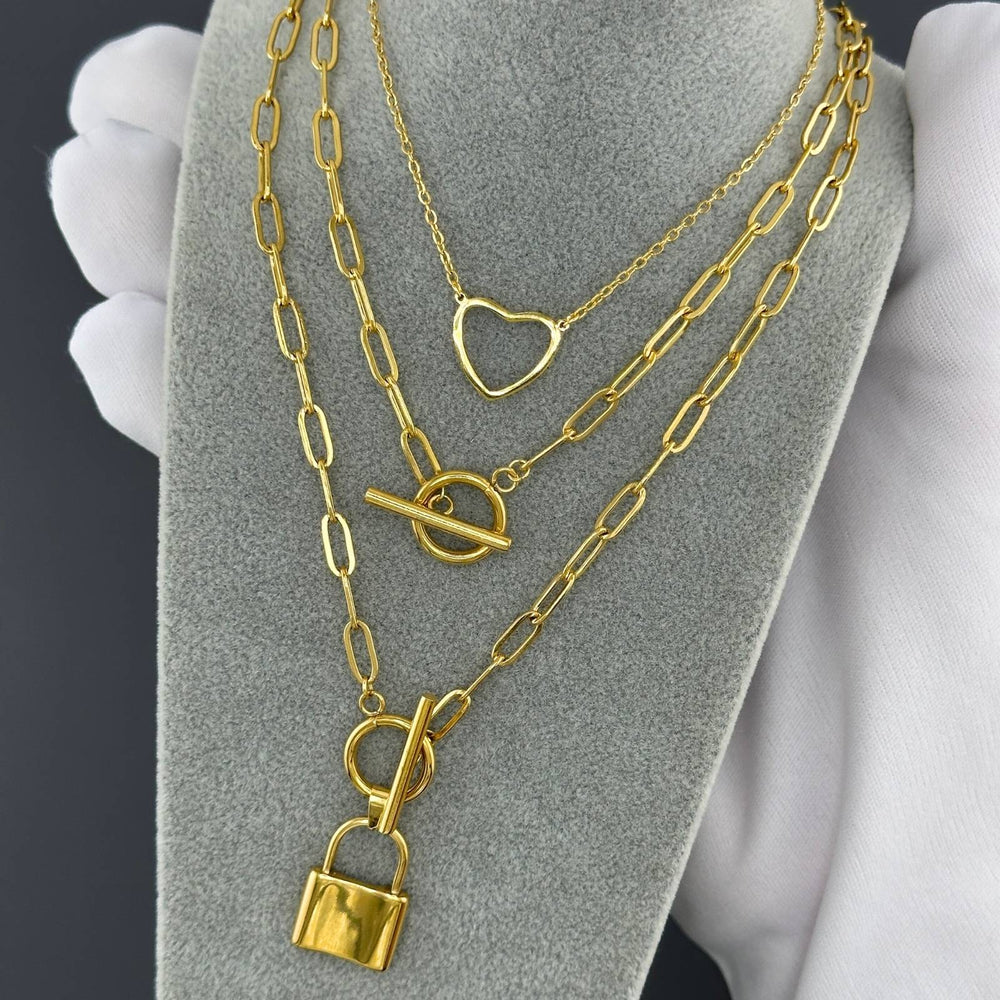 
                  
                    Collar candado de acero inoxidable bañado en oro de 18k - Preppy Boutique by Chemo
                  
                